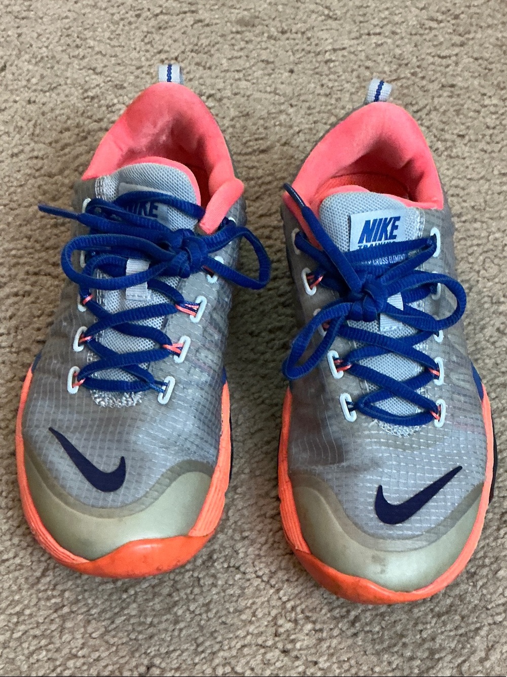 Nike Gray Sneakers with Coral Lining and Blue Details